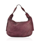 Borsa da spalla con tracolla in vera pelle intrecciata effetto vintage tinto lavato in capo